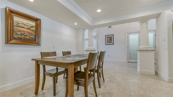 a kitchen with granite countertop a sink stainless steel appliances and cabinets