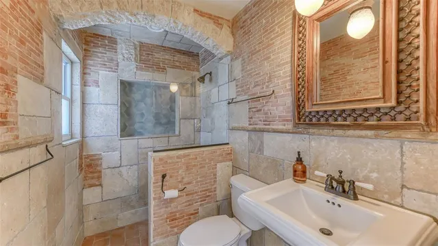 a view of room with furniture and windows