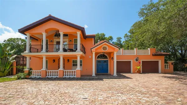 a front view of a house with a garage