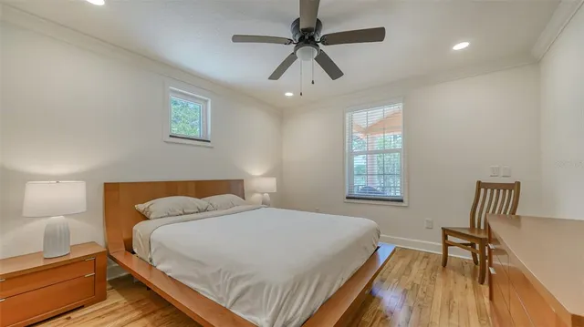 a blue house with trees in front of it