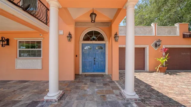 a view of entrance door of house