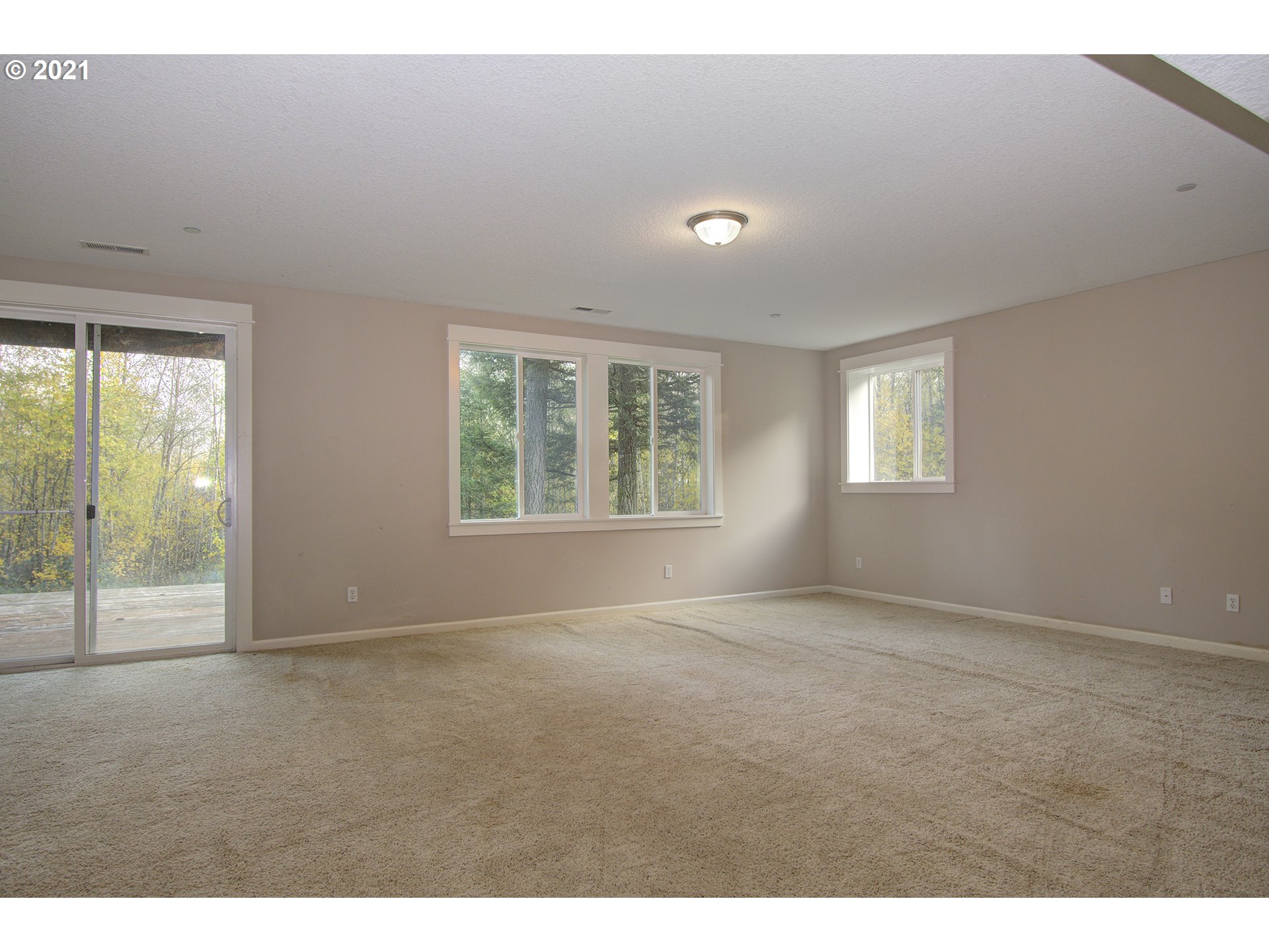 6909 Northeast Lessard Road Camas, WA 98607 - Photo 16 of 30 a view of an empty room with a window
