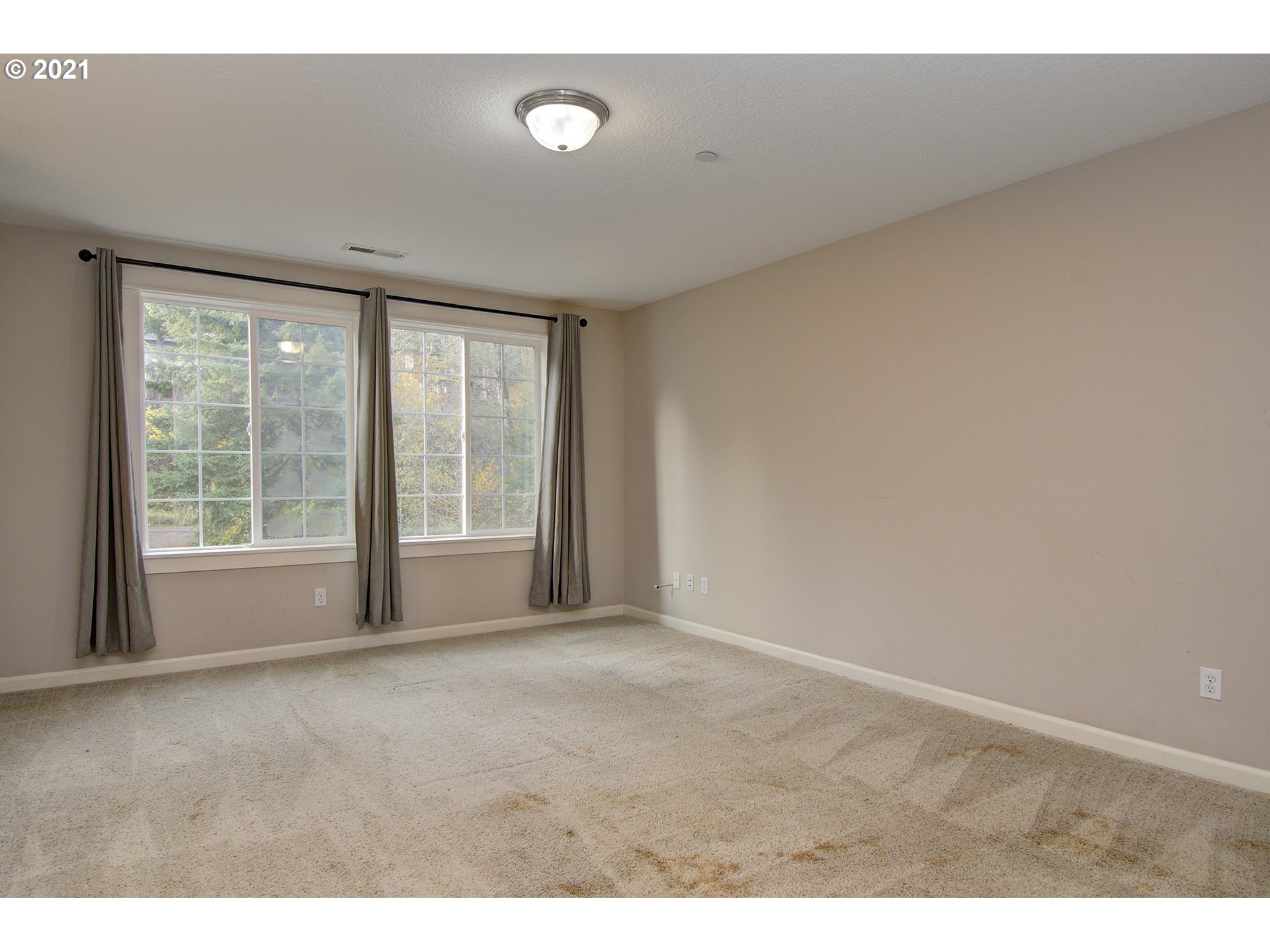 6909 Northeast Lessard Road Camas, WA 98607 - Photo 18 of 30 a view of an empty room with a window