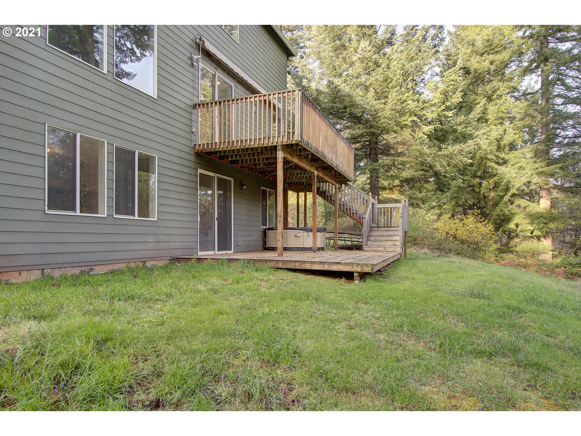 6909 Northeast Lessard Road Camas, WA 98607 - Photo 28 of 30 a view of a house with a backyard
