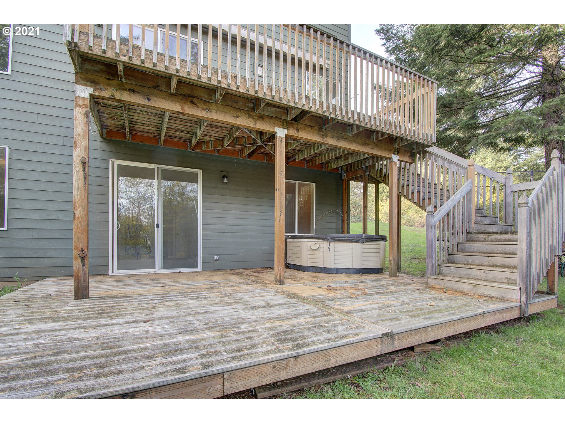 6909 Northeast Lessard Road Camas, WA 98607 - Photo 29 of 30 a view of a house with wooden deck