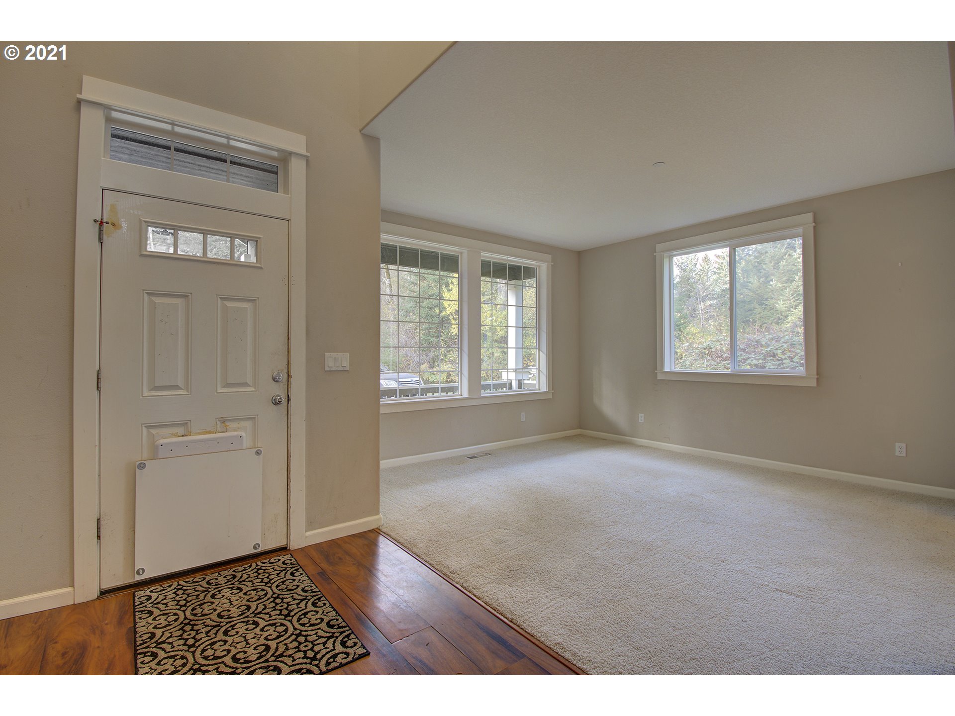6909 Northeast Lessard Road Camas, WA 98607 - Photo 7 of 30 a view of an empty room with windows