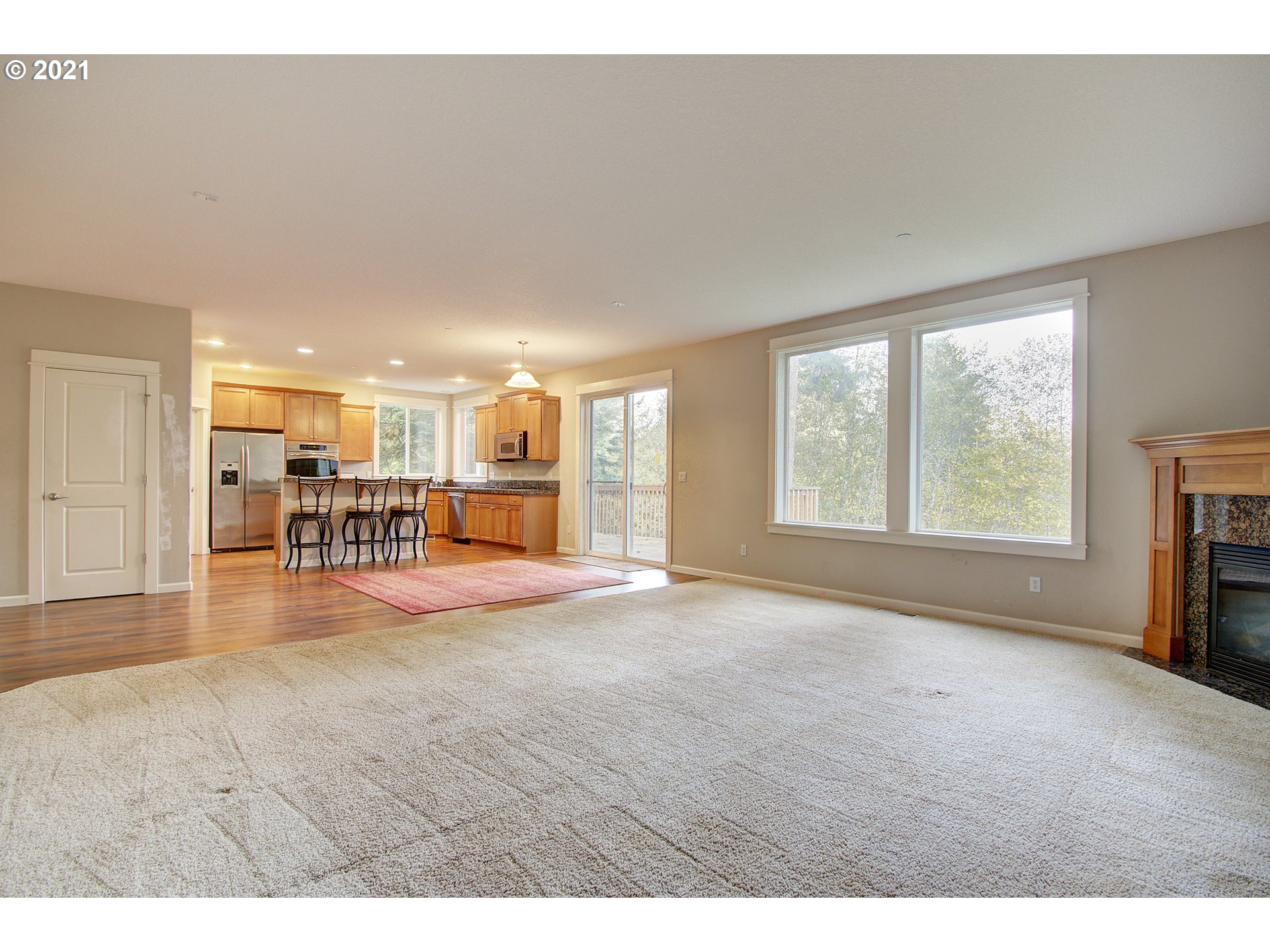 6909 Northeast Lessard Road Camas, WA 98607 - Photo 10 of 30 a view of livingroom with furniture and floor to ceiling window