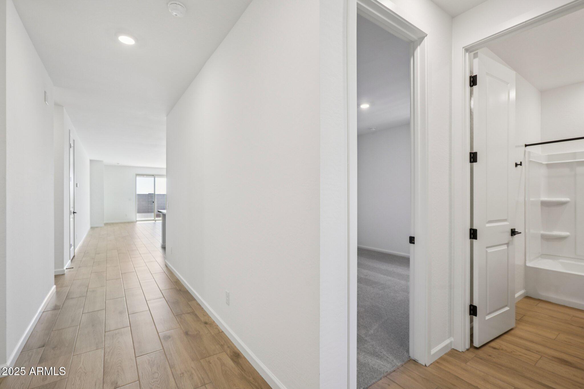 16219 West Bajada Road Surprise, AZ 85387 - Photo 13 of 43 a view of hallway with wooden floor