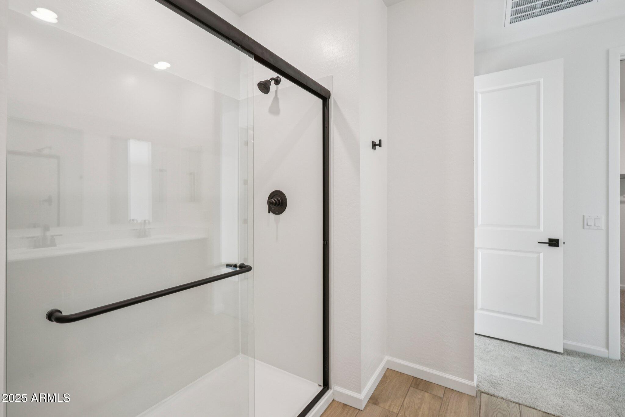 16219 West Bajada Road Surprise, AZ 85387 - Photo 26 of 43 a bathroom with a shower