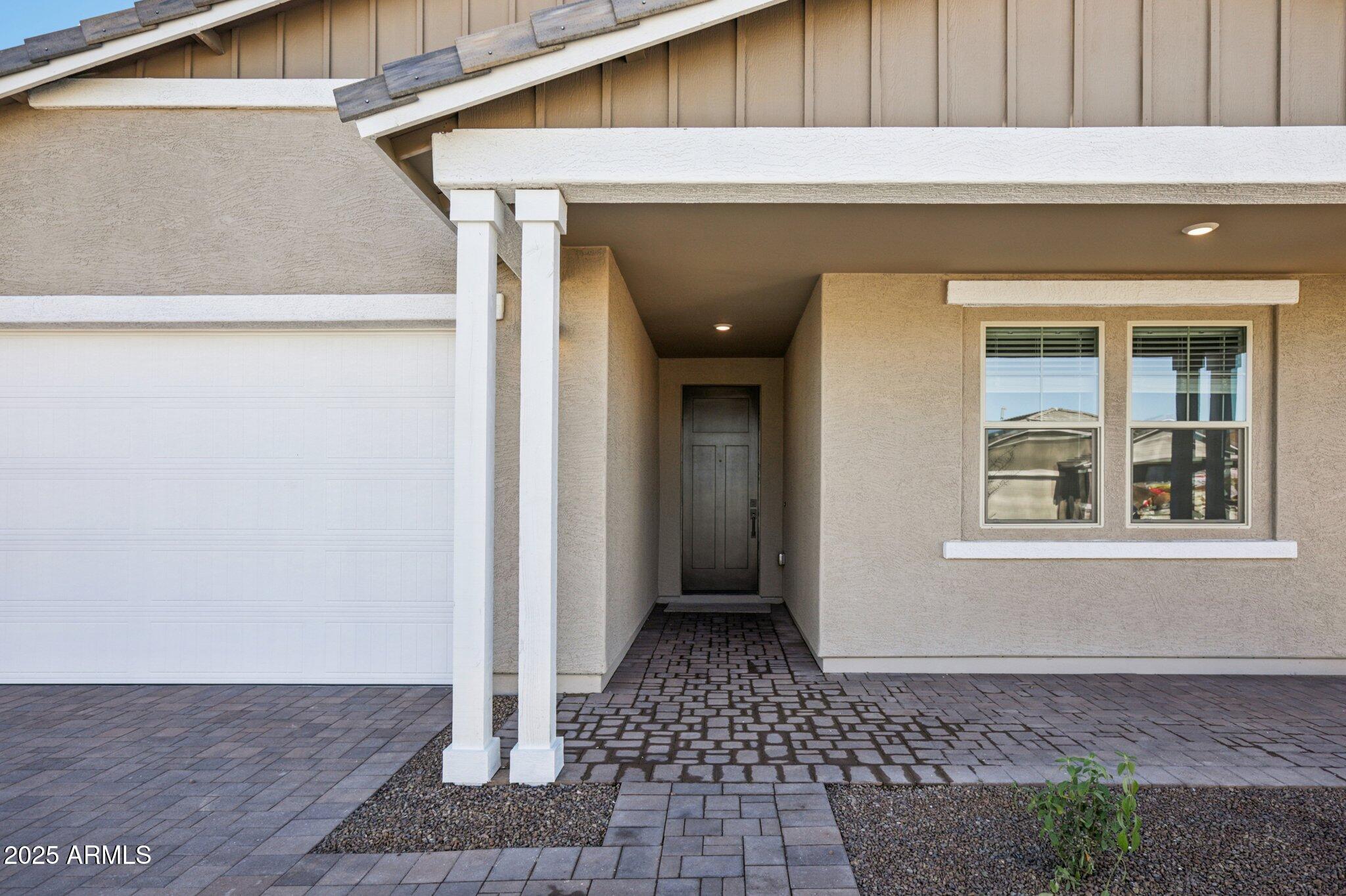 16219 West Bajada Road Surprise, AZ 85387 - Photo 4 of 43 a front view of a house