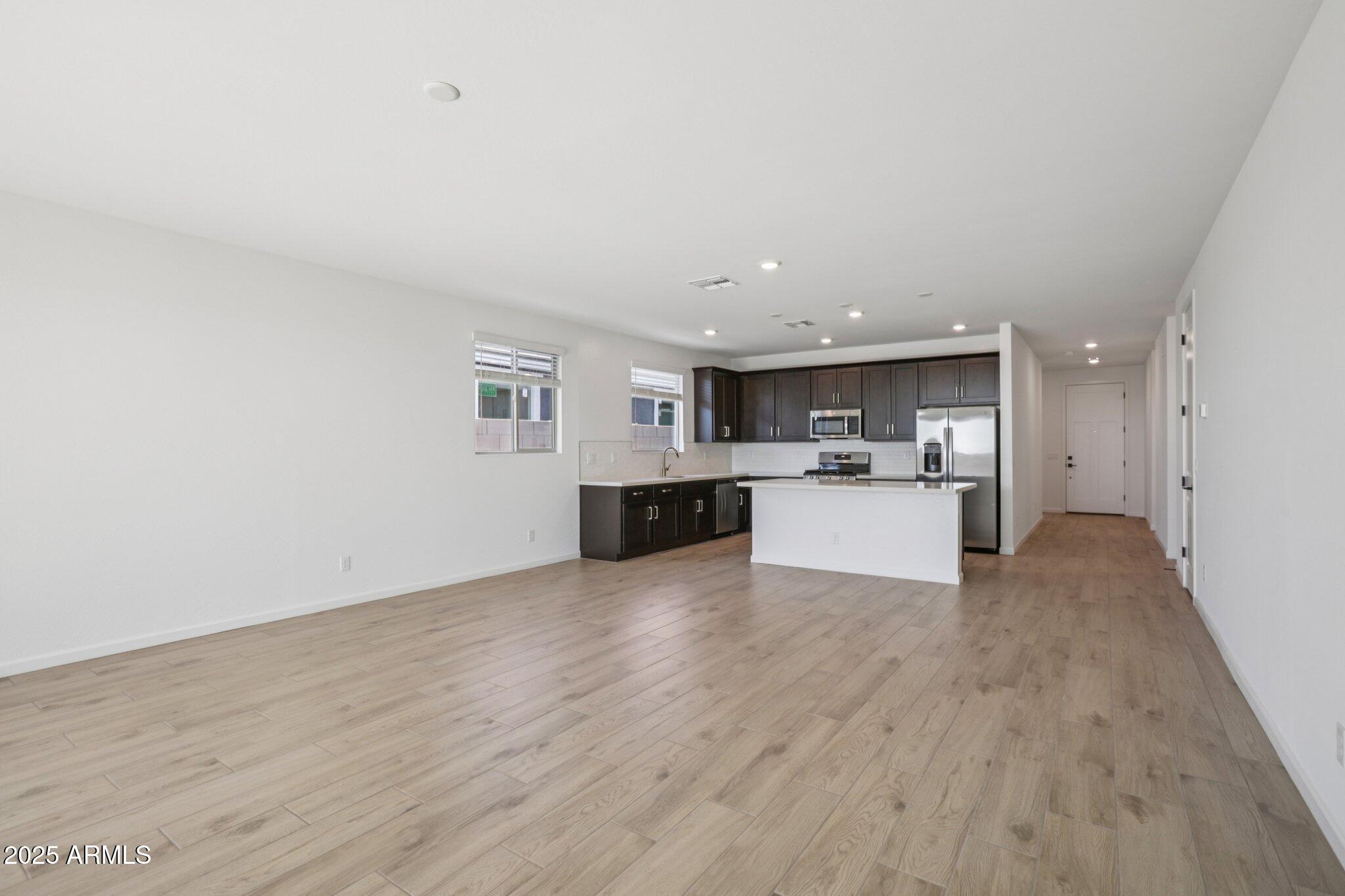16219 West Bajada Road Surprise, AZ 85387 - Photo 6 of 43 a view of kitchen with wooden floor