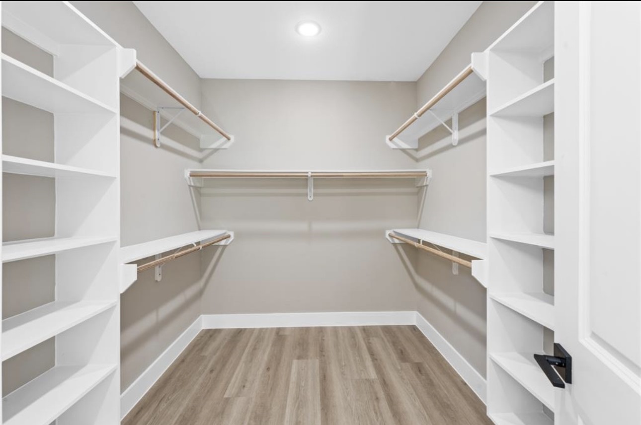 2614 Martinas Ct Spring Spring, TX 77388 - Photo 13 of 16 a view of walk in closet with empty racks