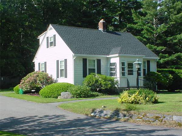 45 Shaker Lane Littleton, MA 01460 - Photo 1 of 30 a front view of a house with a yard