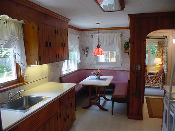 45 Shaker Lane Littleton, MA 01460 - Photo 12 of 30 a kitchen with a sink and a refrigerator