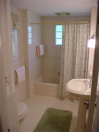 45 Shaker Lane Littleton, MA 01460 - Photo 14 of 30 a bathroom with a granite countertop toilet and a shower