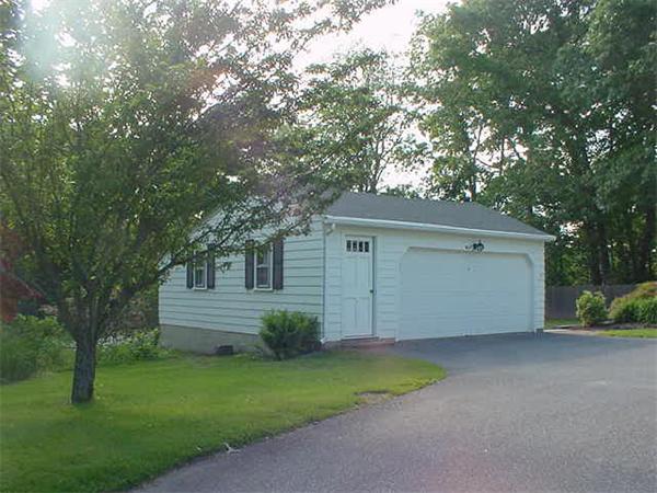 45 Shaker Lane Littleton, MA 01460 - Photo 29 of 30 a view of a house with a yard and large tree