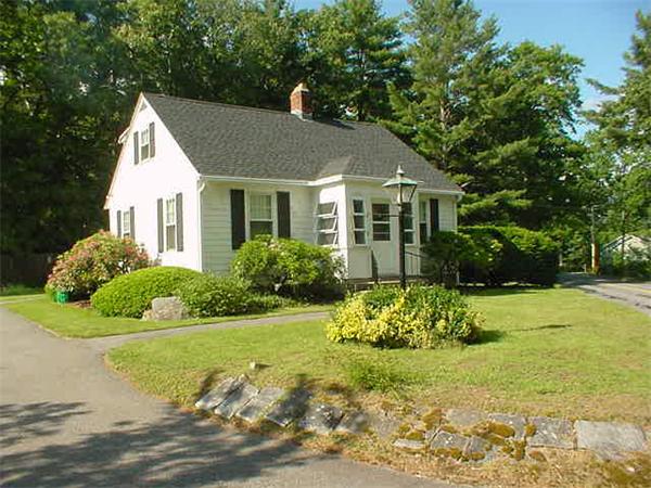 45 Shaker Lane Littleton, MA 01460 - Photo 30 of 30 a front view of a house with garden