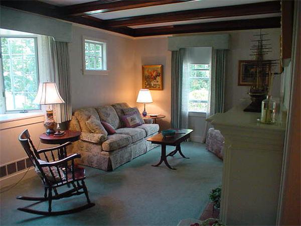 45 Shaker Lane Littleton, MA 01460 - Photo 4 of 30 a living room with furniture and a window