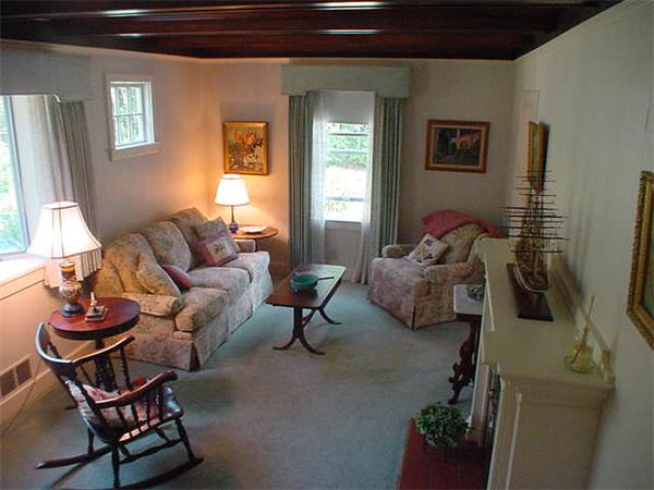 45 Shaker Lane Littleton, MA 01460 - Photo 6 of 30 a living room with furniture and a flat screen tv