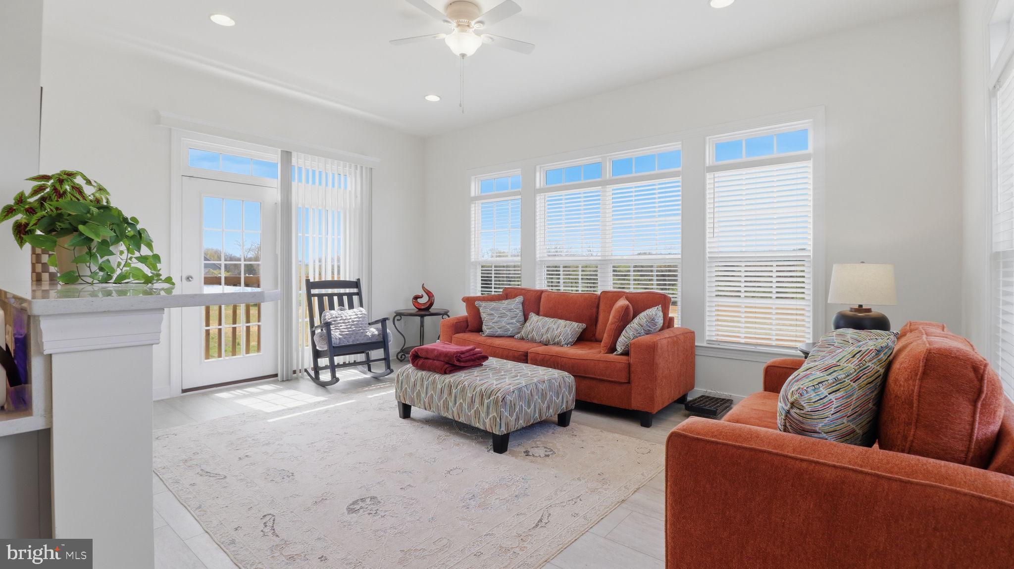 11502 Aden Road Nokesville, VA 20181 - Photo 48 of 106 a living room with furniture and a large window