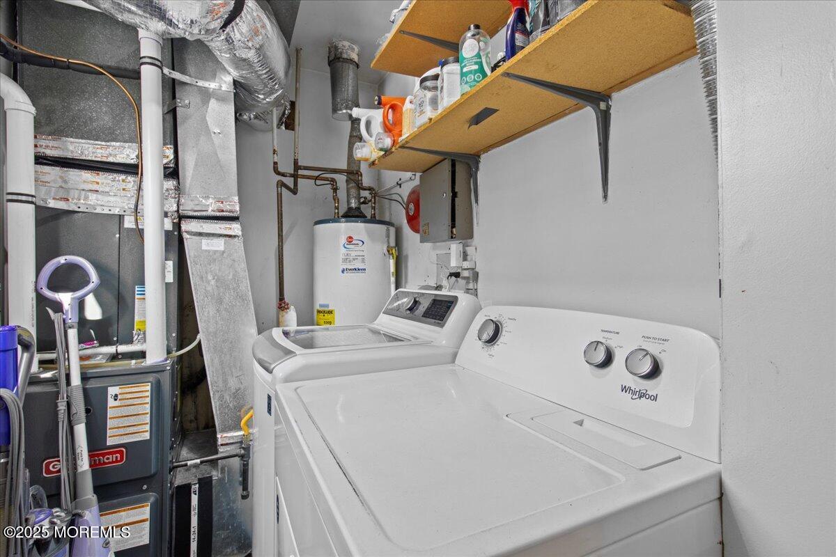2110 Lanes Mill Road Brick, NJ 08724 - Photo 19 of 55 a utility room with dryer and washer