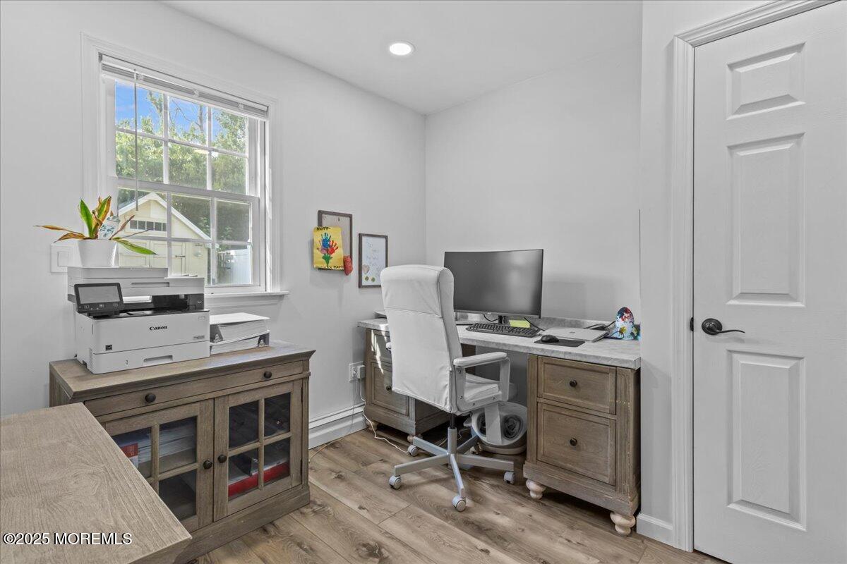 2110 Lanes Mill Road Brick, NJ 08724 - Photo 20 of 55 a view of a workspace with furniture and a window