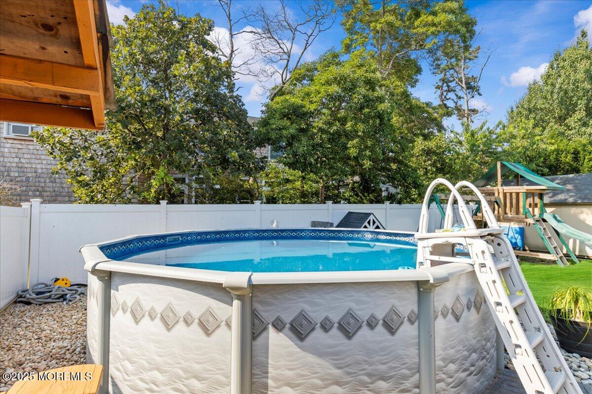 2110 Lanes Mill Road Brick, NJ 08724 - Photo 33 of 55 a view of swimming pool with a patio