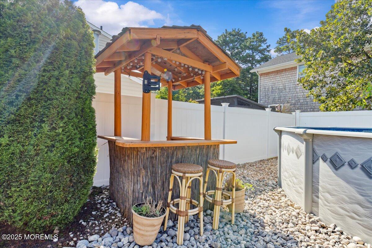 2110 Lanes Mill Road Brick, NJ 08724 - Photo 34 of 55 a view of a chair and table in backyard
