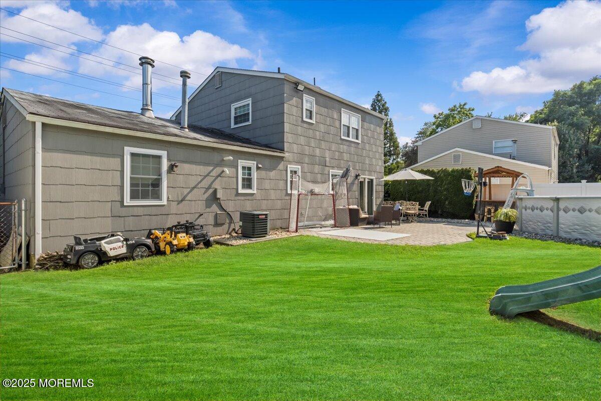 2110 Lanes Mill Road Brick, NJ 08724 - Photo 38 of 55 a front view of a house with a yard