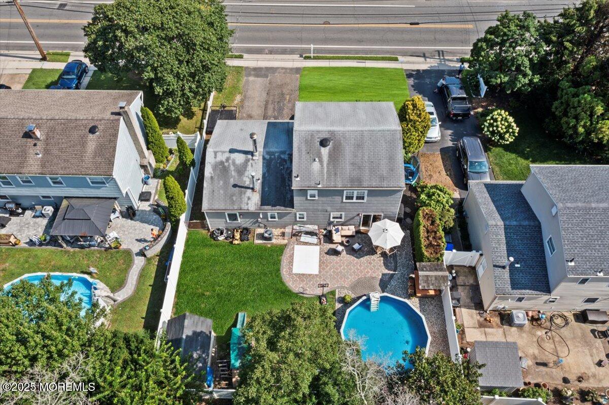 2110 Lanes Mill Road Brick, NJ 08724 - Photo 41 of 55 an aerial view of a house with outdoor space pool seating area and yard