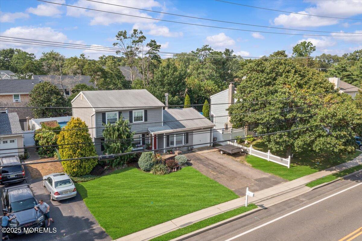 2110 Lanes Mill Road Brick, NJ 08724 - Photo 45 of 55 a front view of a house with garden