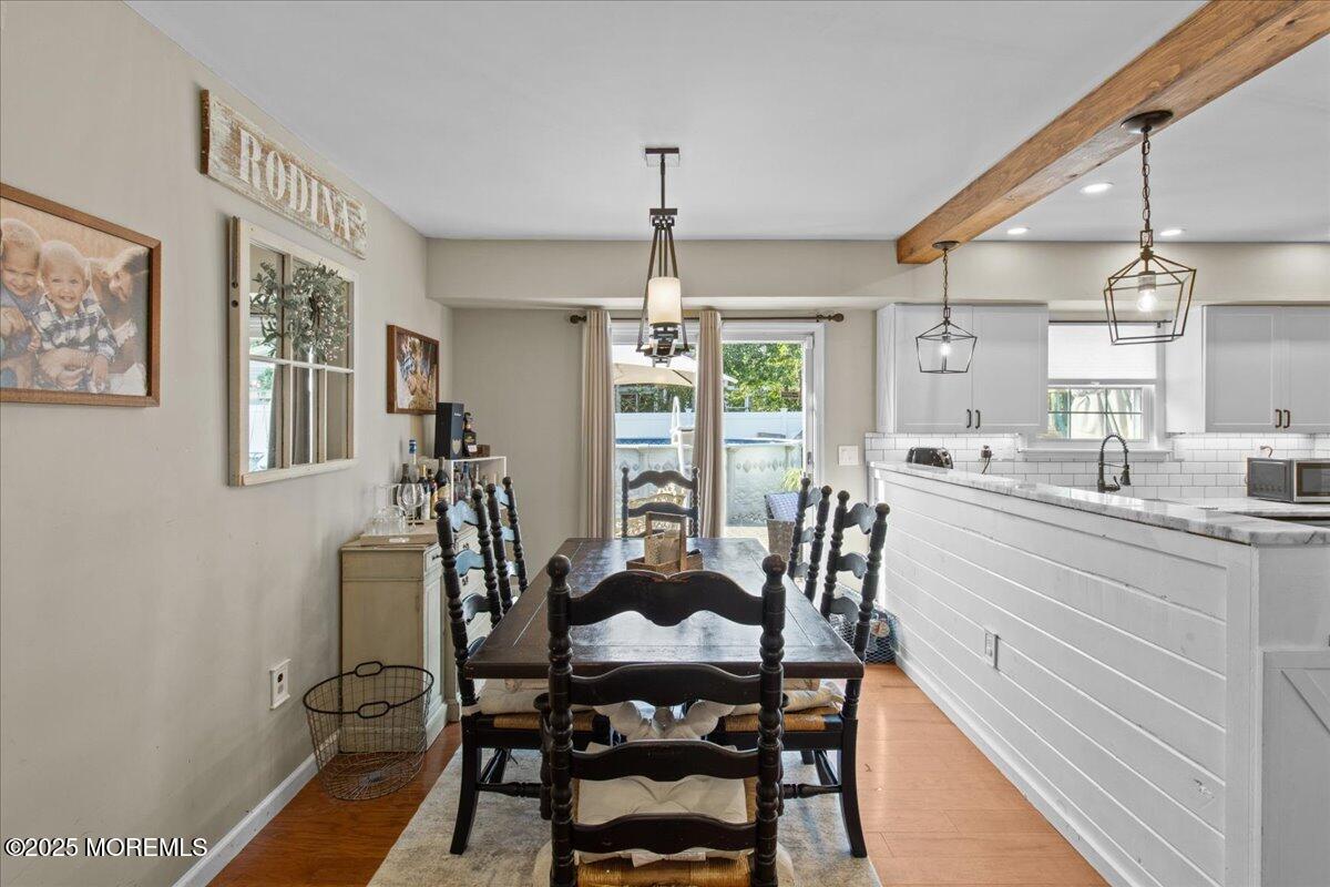 2110 Lanes Mill Road Brick, NJ 08724 - Photo 9 of 55 a view of a dining room with furniture window and outside view