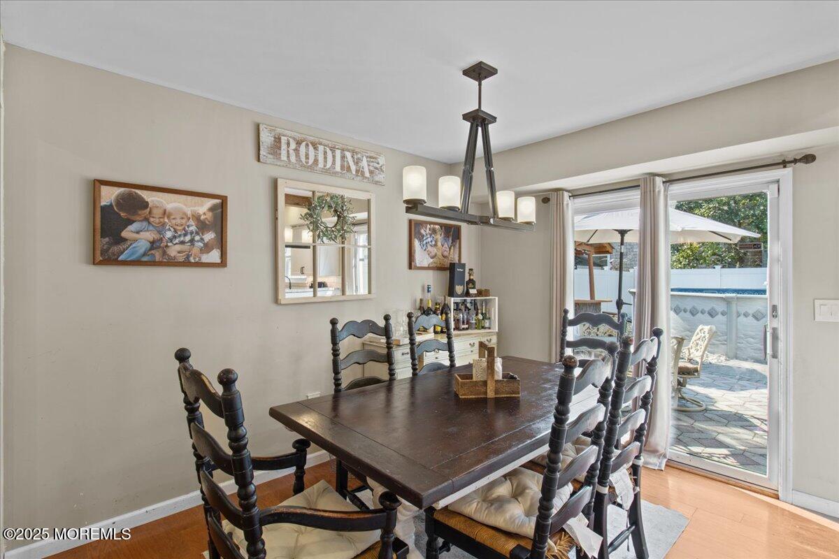 2110 Lanes Mill Road Brick, NJ 08724 - Photo 10 of 55 a view of a dining room with furniture window and outside view