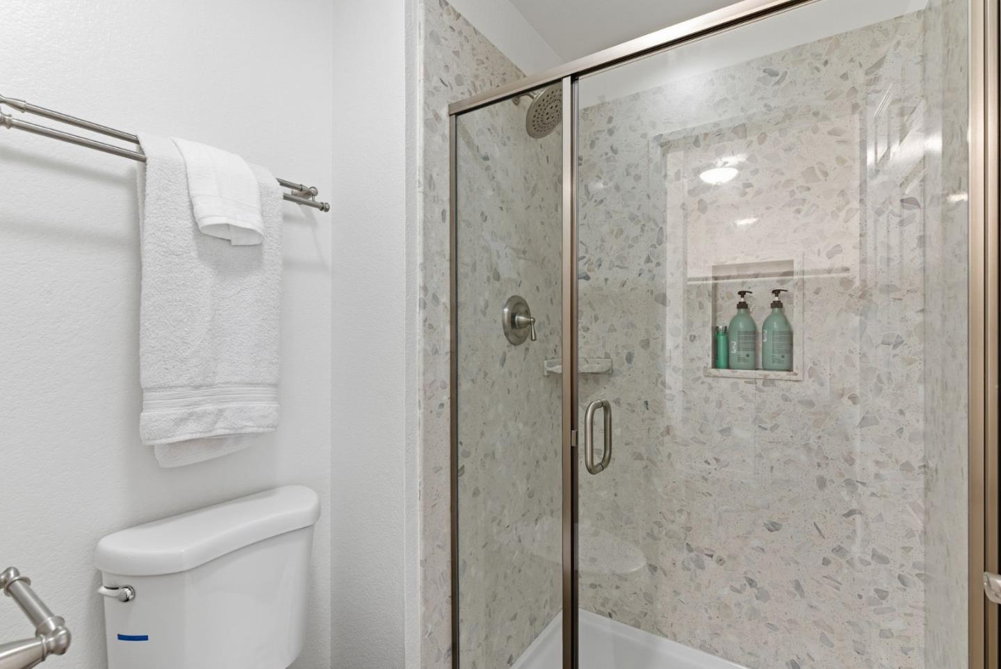 673 Royston Lane, Unit 233 Hayward, CA 94544 - Photo 24 of 32 a bathroom with a shower and a toilet