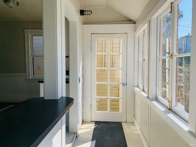 an empty room with windows