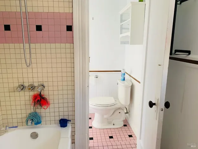 a bathroom with a sink and a shower curtain