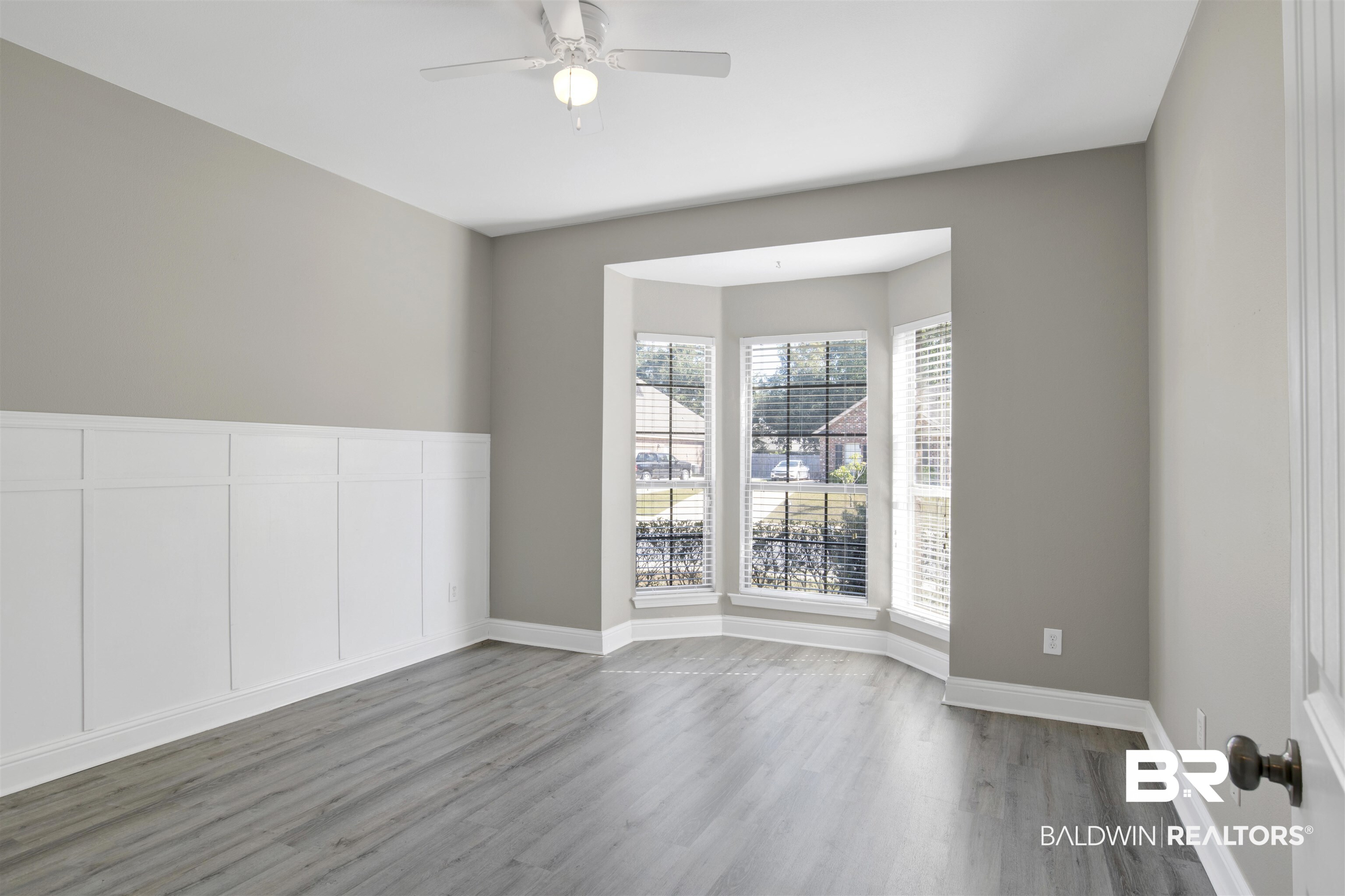 24159 Tullamore Drive Daphne, AL 36526 - Photo 16 of 31 Spare room featuring wood-type flooring and ceiling fan