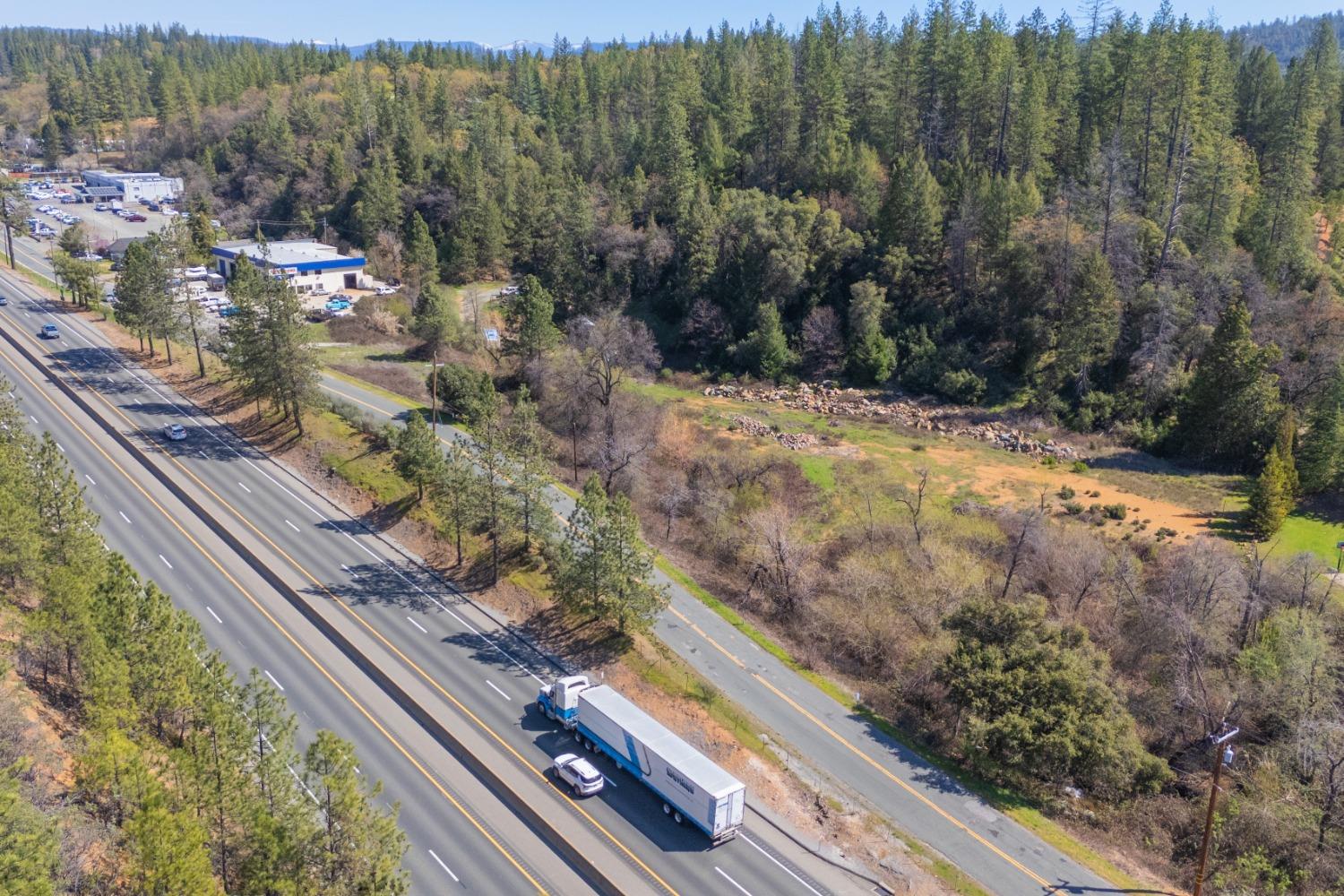 1836 Canyon Way Colfax, CA 95713 - Photo 13 of 25 a view of a yard with a wooden bench