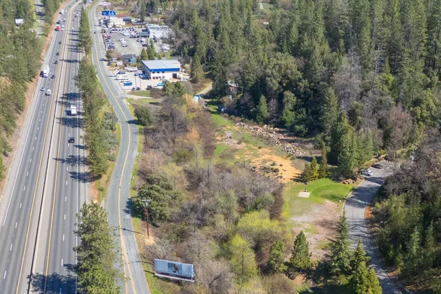 a view of a city with a yard
