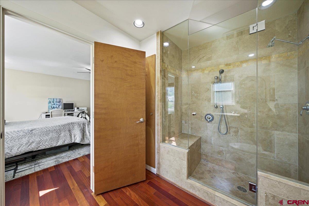 16470 6300th Road Montrose, CO 81403 - Photo 20 of 35 a bathroom with a tub and shower