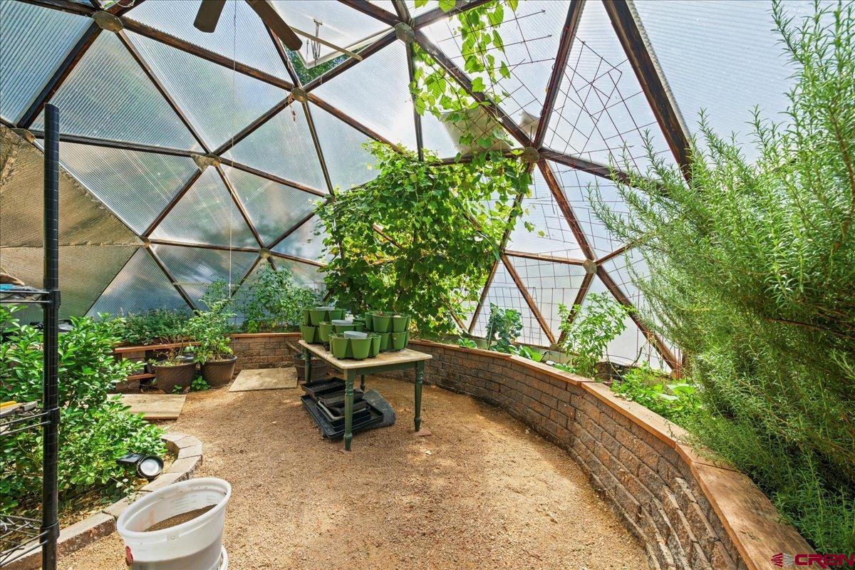 16470 6300th Road Montrose, CO 81403 - Photo 28 of 35 a backyard of a house with outdoor seating