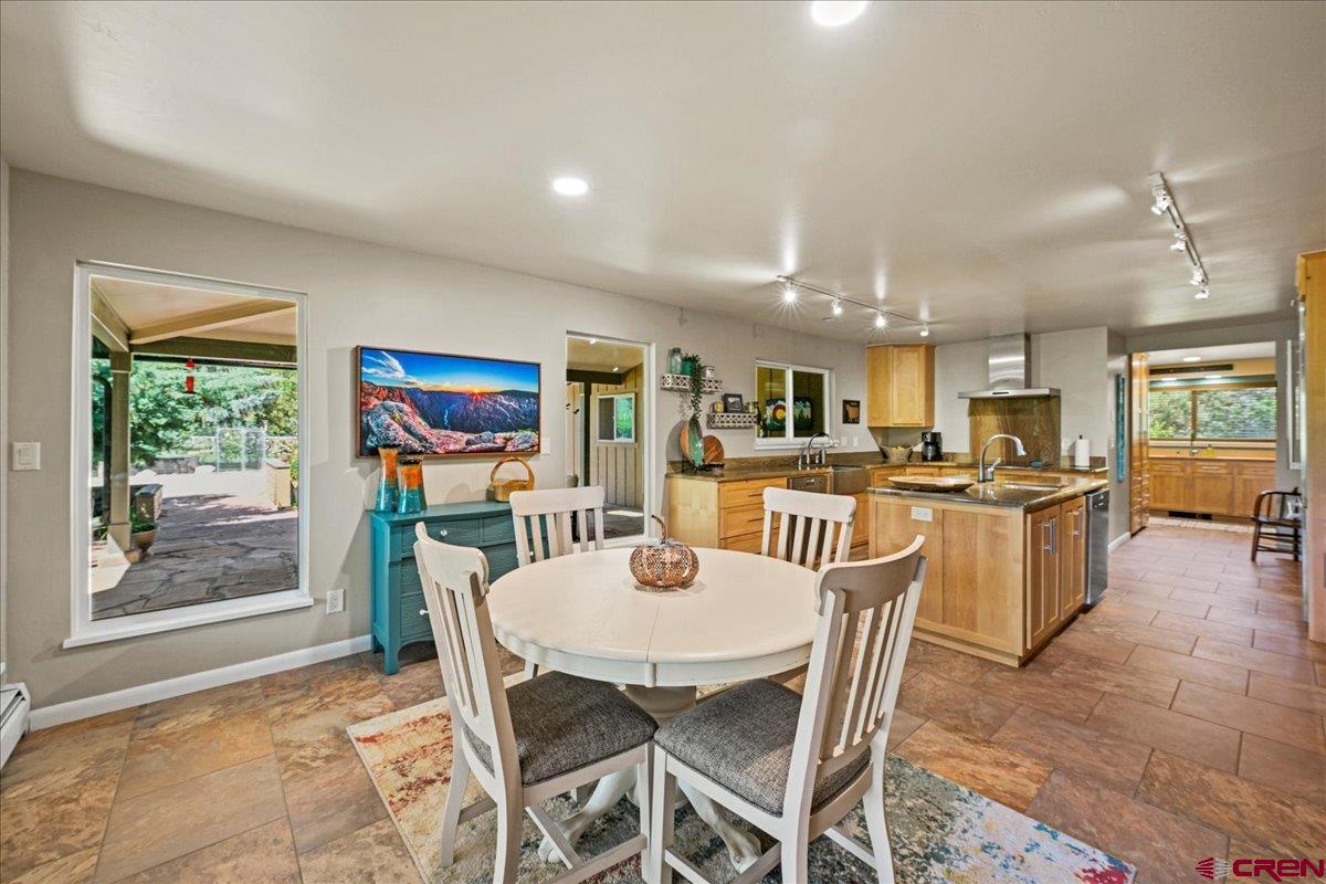 16470 6300th Road Montrose, CO 81403 - Photo 7 of 35 a dining room with furniture and window