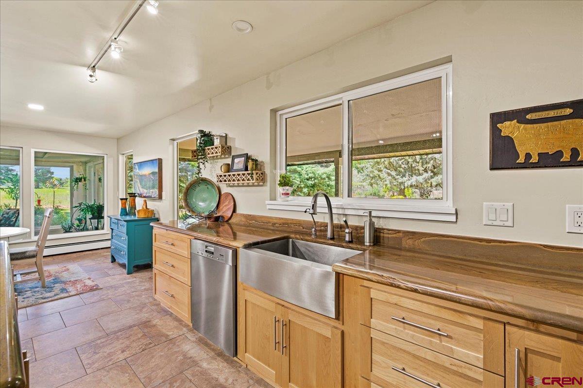 16470 6300th Road Montrose, CO 81403 - Photo 10 of 35 a kitchen that has a sink and a stove