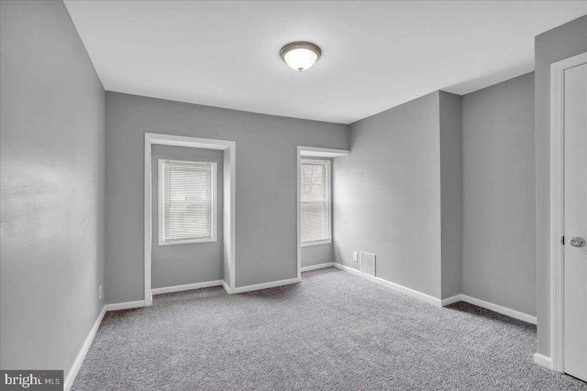 407 Powell Street Gloucester City, NJ 08030 - Photo 16 of 22 a view of an empty room with closet area