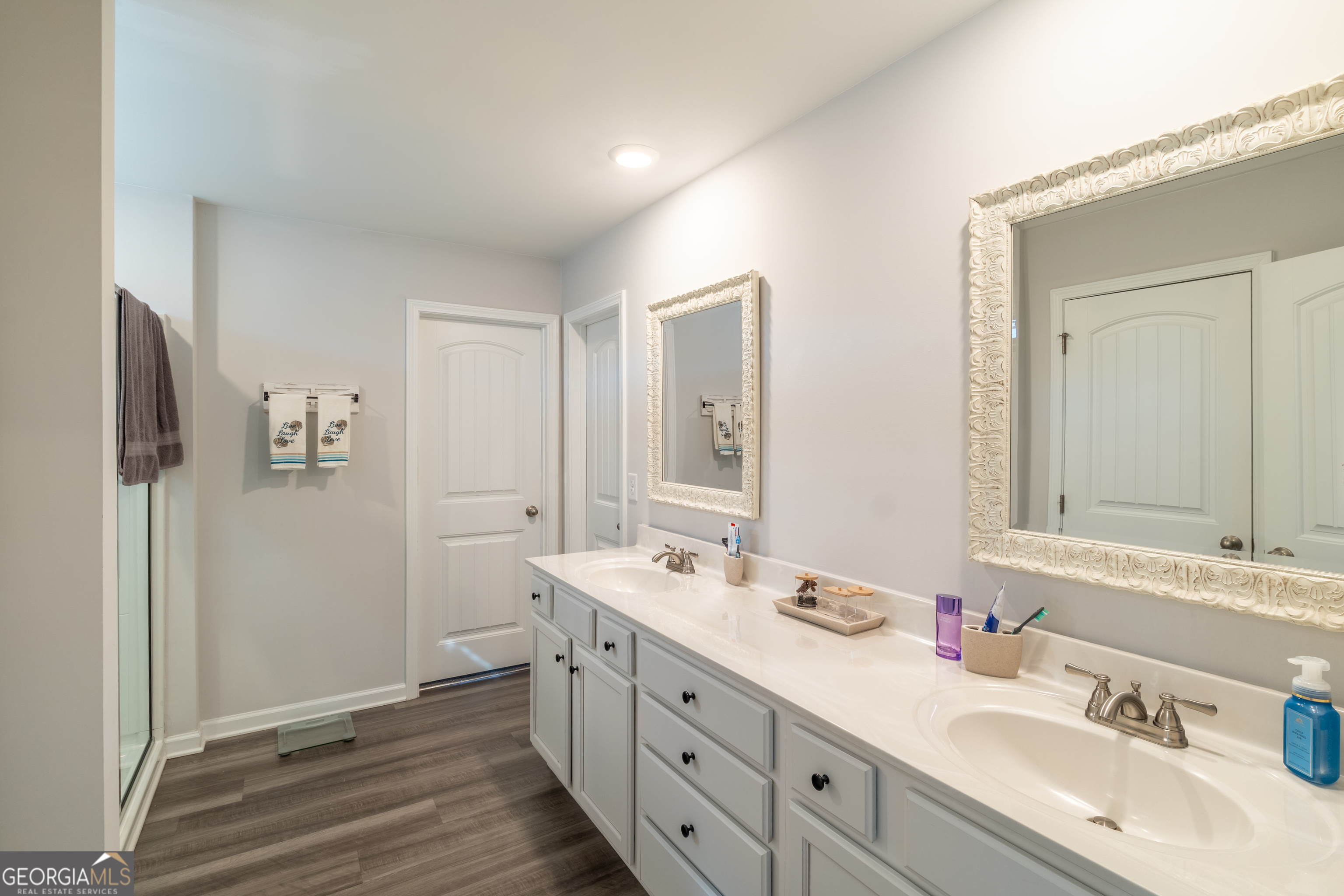 728 Cherokee Rose Bremen, GA 30110 - Photo 35 of 78 a spacious bathroom with a double vanity sink mirror and shower