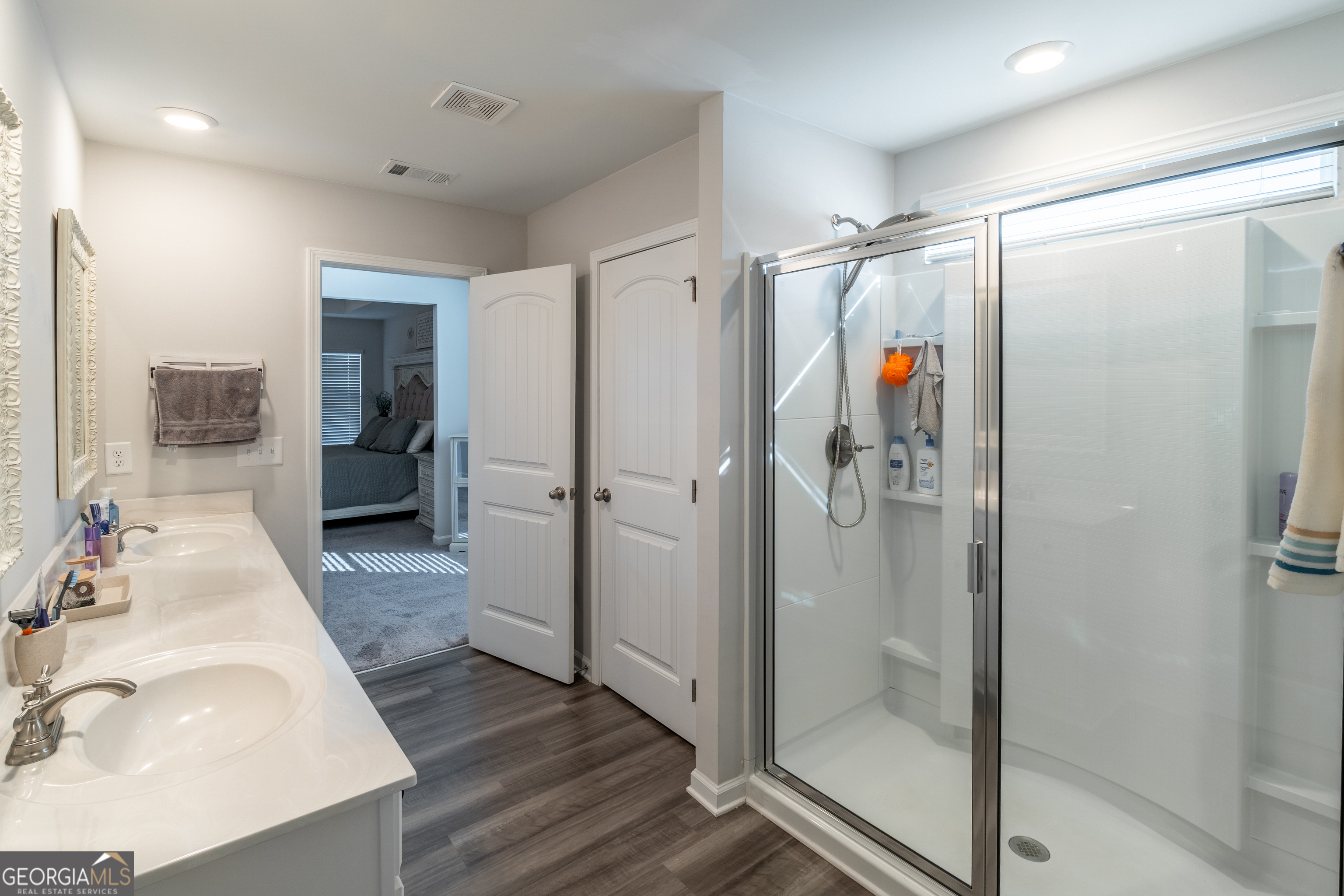 728 Cherokee Rose Bremen, GA 30110 - Photo 36 of 78 a bathroom with a tub shower vanity and a sink