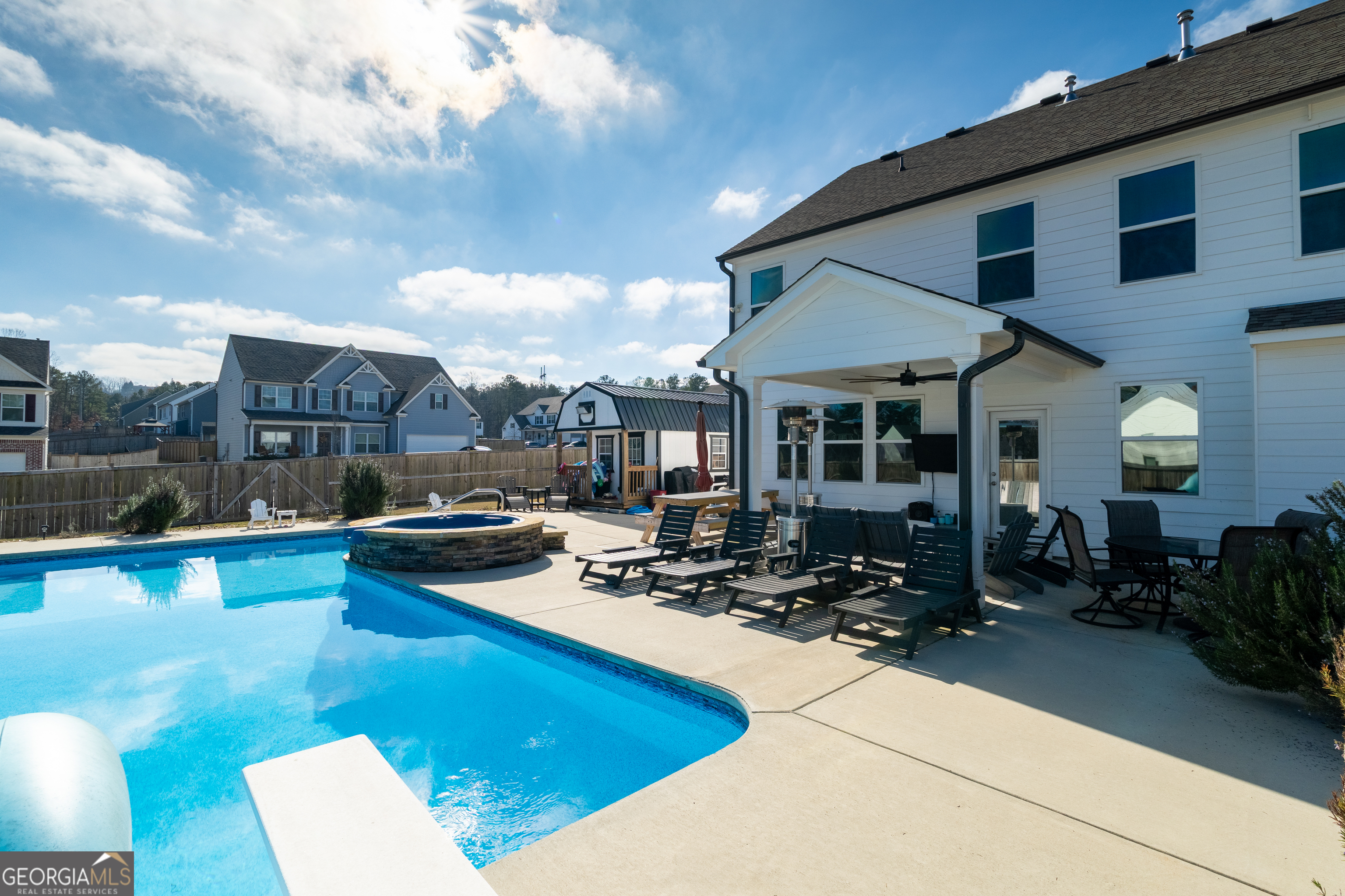 728 Cherokee Rose Bremen, GA 30110 - Photo 49 of 78 a view of a house with swimming pool and sitting area