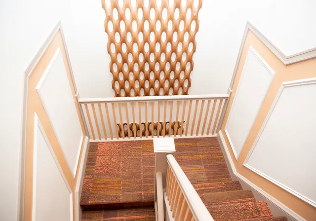 a view of balcony with wooden floor
