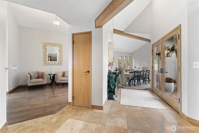 a living room with furniture and a table