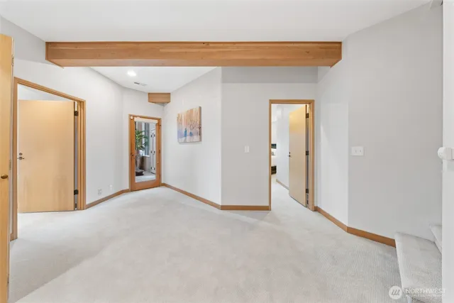 a bed room with a bed and a night stand